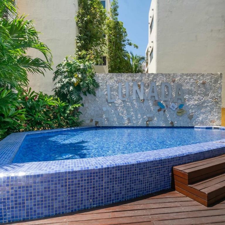 Quiet Condo W Rooftop Pool, Backyard & Parking - Two-Bedroom Apartment with Balcony - 23