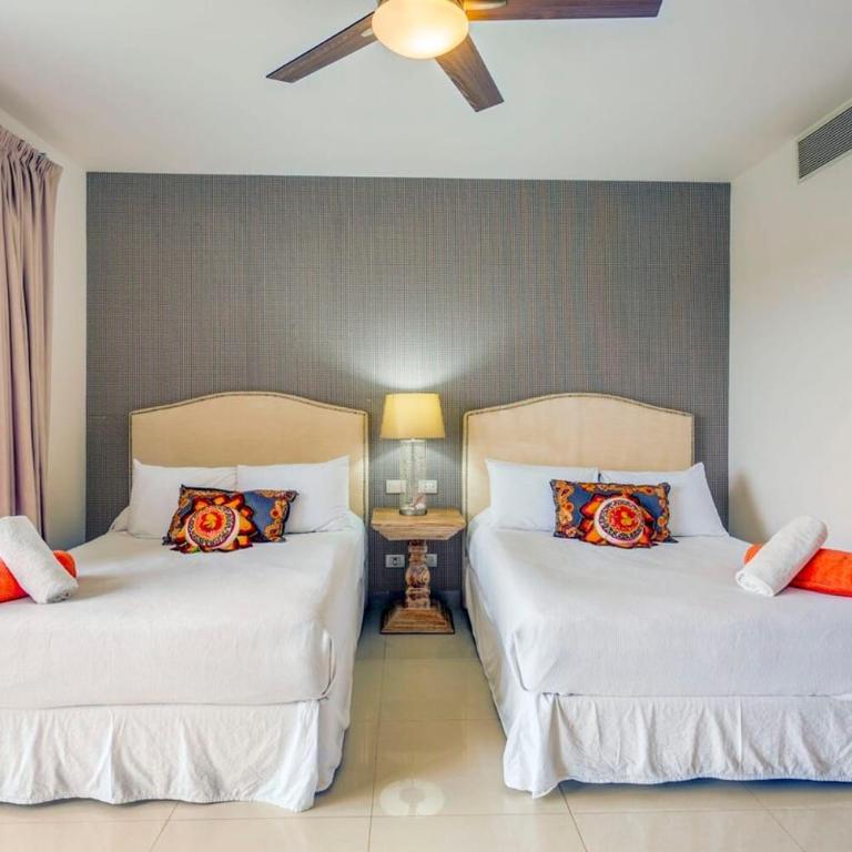 Tropical Resort Living W Pool, Hot Tub & Gym - Two-Bedroom Apartment with Balcony - 31