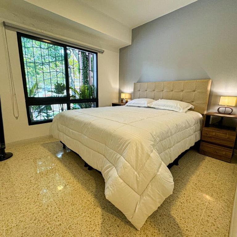 1Br Best Location Laureles with AC - Three-Bedroom Apartment - 11