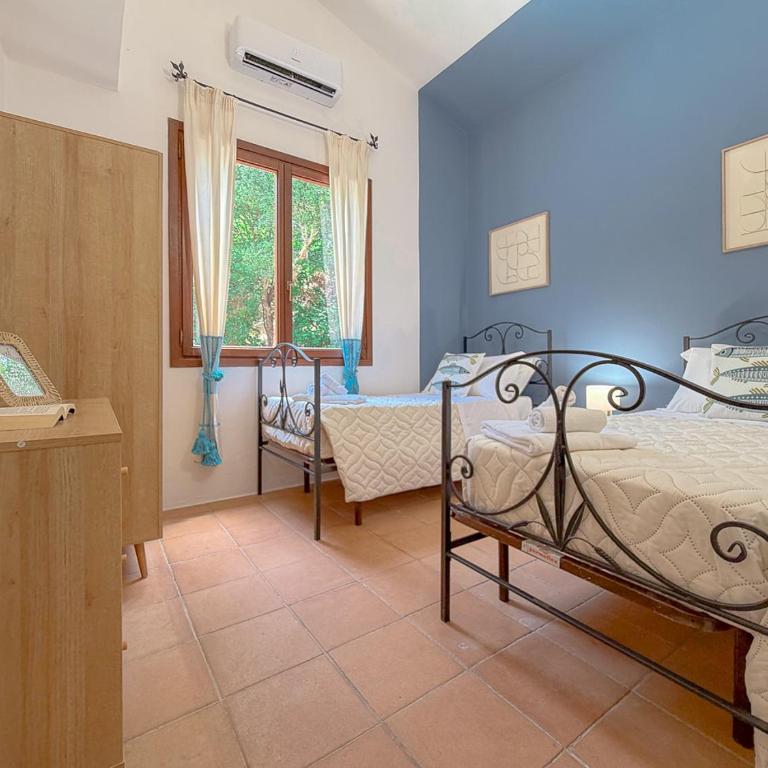 Sea View over Portisco Bay - Spacious 3BR Home - Clima by Host Hero - Apartment - 24