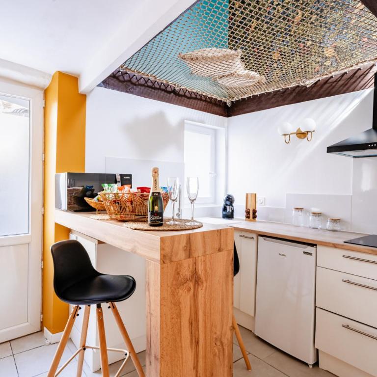 La Canopée - Idéal couples - Filet de catamaran suspendu - Balnéo - Maisonnette sur 2 étages de 45m2 - Clim réversible - Netflix - Wifi - Maison 1 Chambre - 4