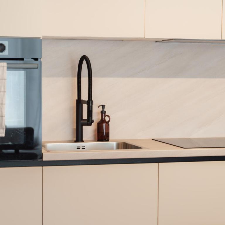 MiHome - modern Living - Apartment mit 1 Schlafzimmer und Balkon - 24