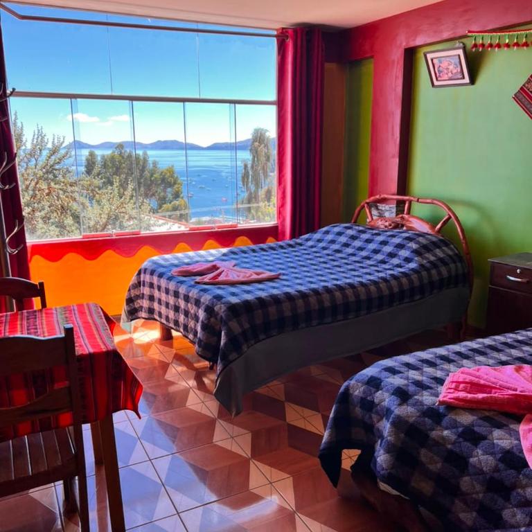 Hostal Sol y Lago - Habitación Doble con baño privado y vistas al lago - 2 camas - 2