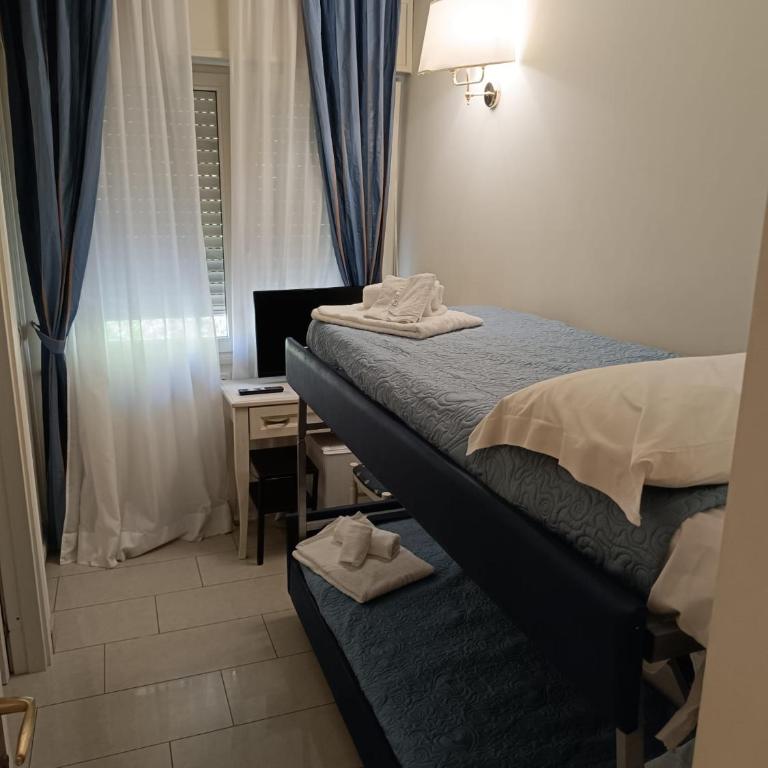 Hotel Nelson - Camera Budget Doppia con Letti Singoli - 1