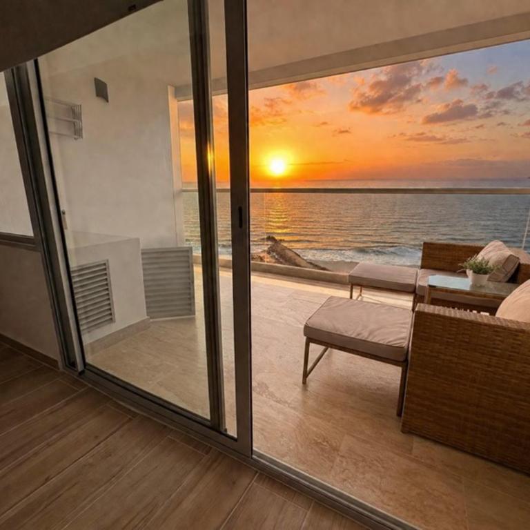 Sunset Frente al Mar -Piscina - Cerca Aeropuerto - One-Bedroom Apartment with Balcony and City View - 7
