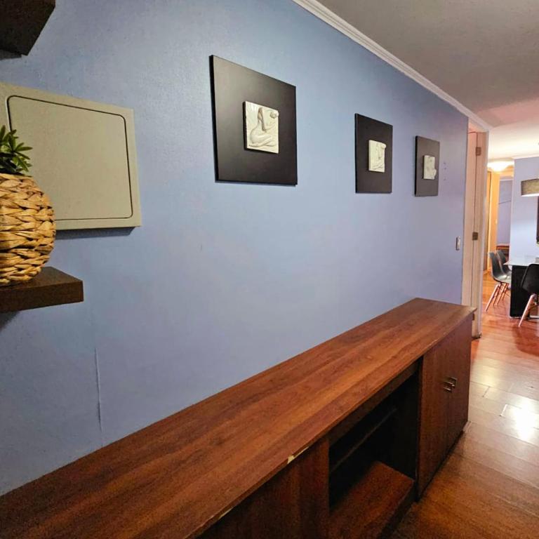 bulnes la moneda departamentos amoblados AVILA - Family Room with Balcony - 4
