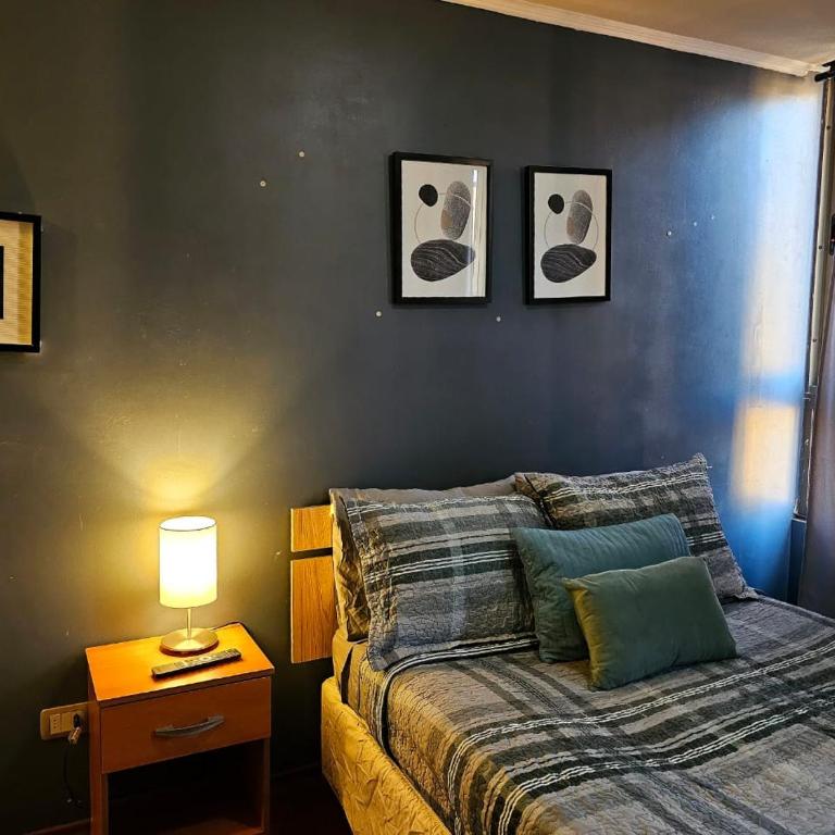bulnes la moneda departamentos amoblados AVILA - Family Room with Balcony - 7