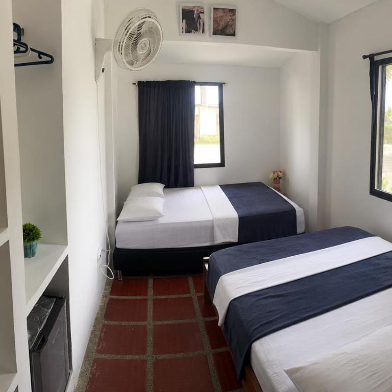 Hotel Mar del Viento - Habitación Cuádruple - vistas al jardín - 2
