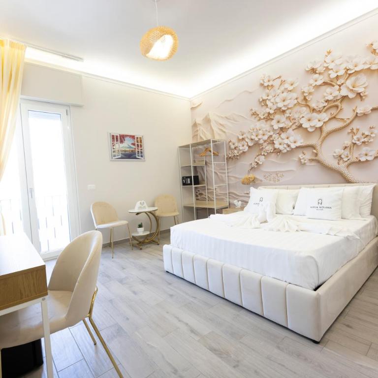 Aurum Nolana Suites - Camera King con Vista Montagne - 1