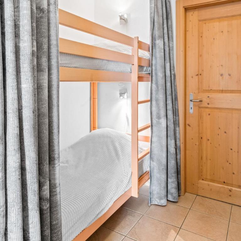 Appartement 3,5 pièces, Jacuzzi extérieur et Vue panoramique - Appartement 2 Chambres avec Vue sur la Montagne - 16
