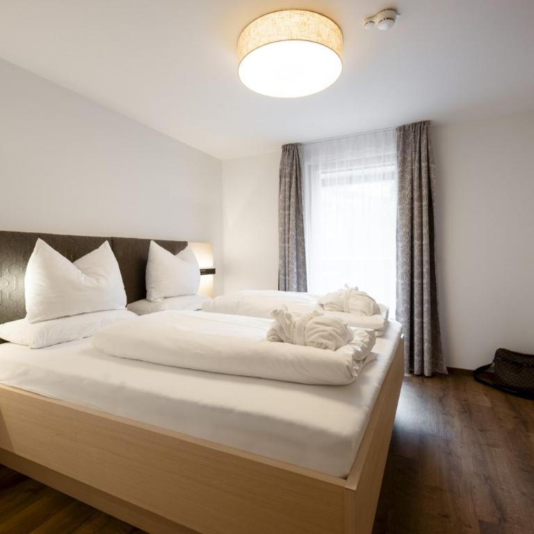 Aparthotel Saladina direkt an der Talstation - Apartment mit 2 Schlafzimmern und Balkon - 11