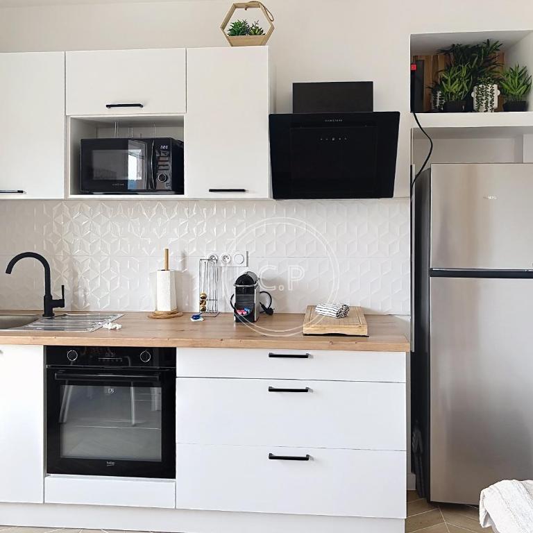 Studio Namasté climatisé Parking 2 lits 4 pers à 200m de la belle plage lumière - Apartment mit 1 Schlafzimmer - 7