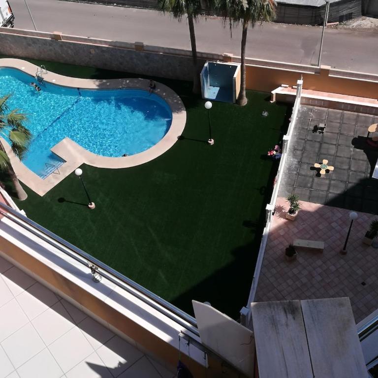 Ático con terraza y piscina, vistas al mar - Two-Bedroom Apartment with Balcony and Sea View - 21