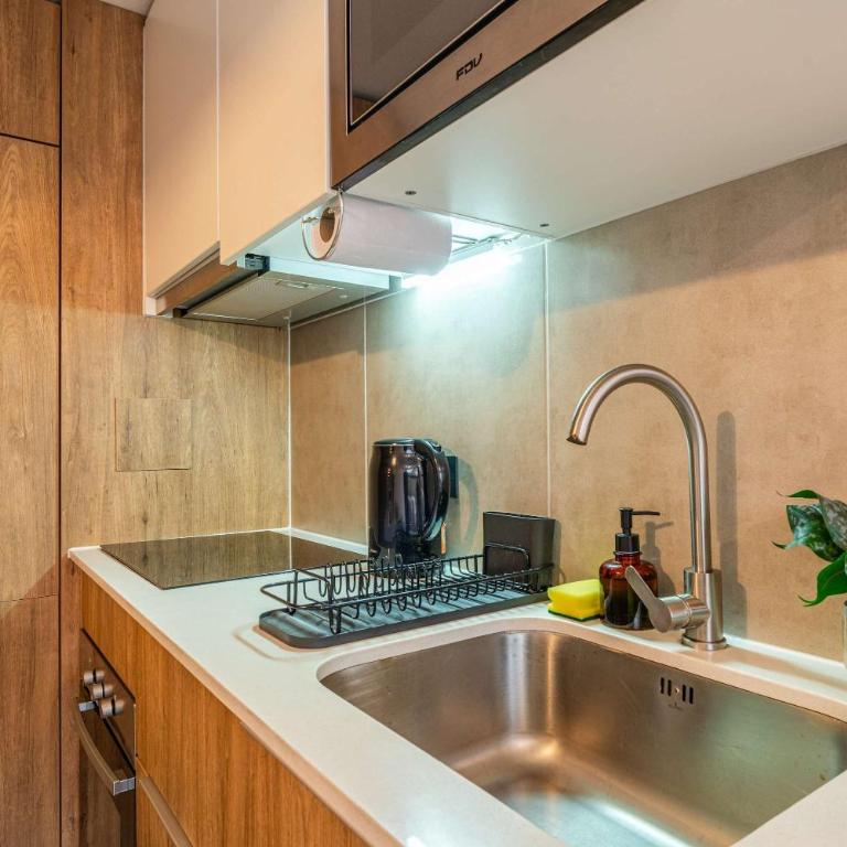HOM I 2D2B, Calefactor Estacionamiento Lavanderia - Apartamento - 27