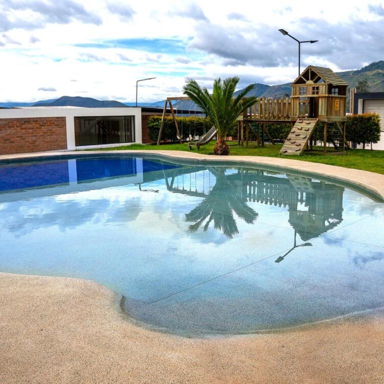 Casa 20 Moderna con piscina y vista a Ibarra - Casa de 2 dormitorios - 26