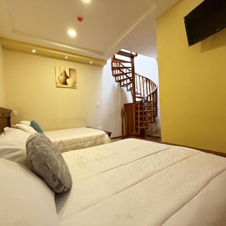 Hotel Casa Ruth Boutique Cuenca - Habitación Triple Confort - 8