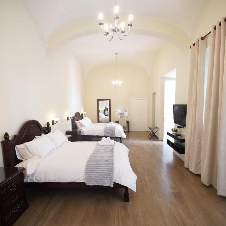 Patrimonial Hotel Boutique - Habitación Doble Deluxe con ducha - 7