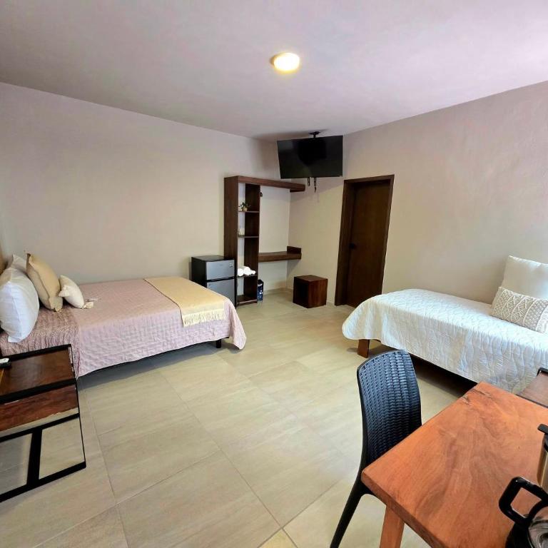 MINERVA LOFTS and SUITES - Habitación Doble con patio - 9