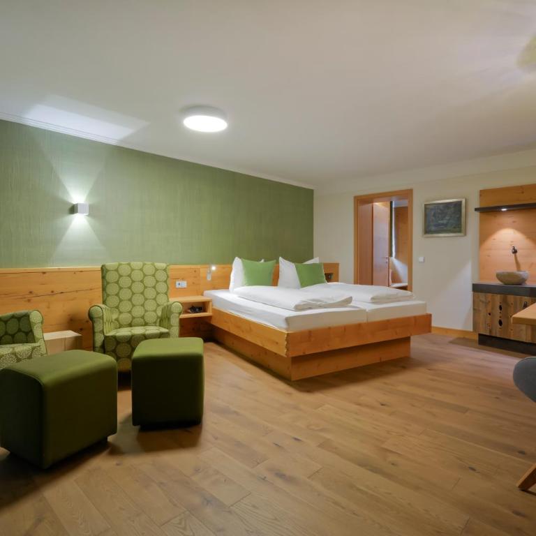 Dreimäderlhaus - Das vegetarische Boutique Hotel - Premium Familienzimmer mit Seeblick - 12