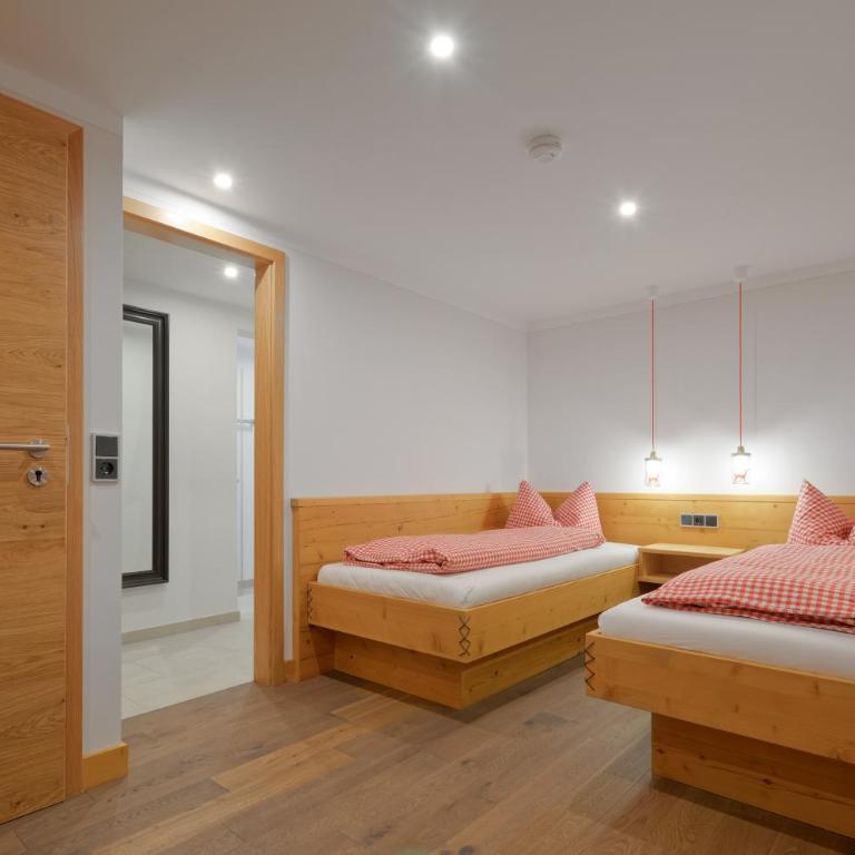 Dreimäderlhaus - Das vegetarische Boutique Hotel - Premium Familienzimmer mit Seeblick - 9