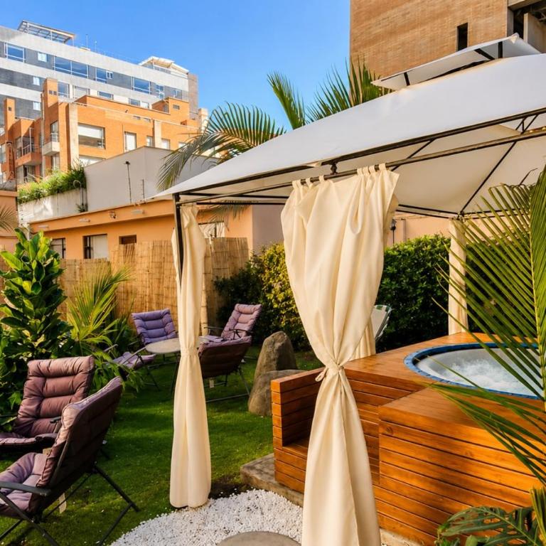 Villa Bamboo Oasis - NUJU Rentals Bogota - Apartamento Deluxe de 2 dormitorios con vistas al jardín - 18