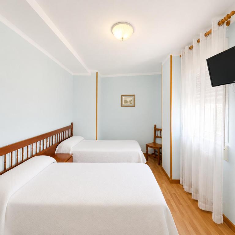 Hostal ** EC León - Habitación Doble - 2 camas - 8