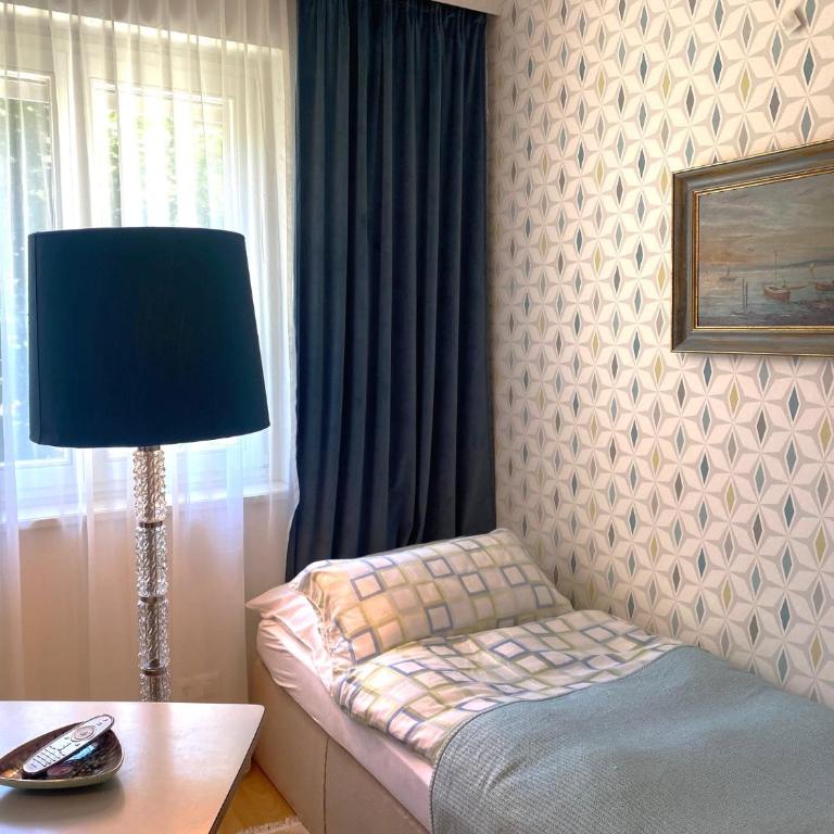 Villa Gabriela Boutique Pension in Pörtschach - Deluxe Dreibettzimmer - 11