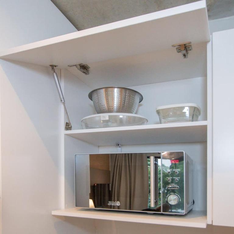 Urban Oasis Near Malls with Pool Gym and BBQ - Apartamento - 14