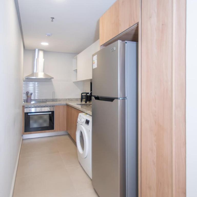 Cozy Central Stay Near Top Malls with Pool and Gym - Apartamento - 7