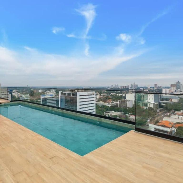 Cozy Central Stay Near Top Malls with Pool and Gym - Apartamento - 20