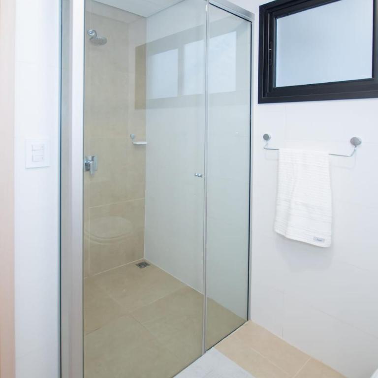 Cozy Central Stay Near Top Malls with Pool and Gym - Apartamento - 18