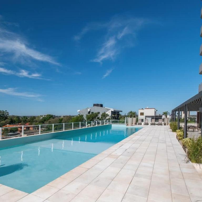 Executive Retreat with Balcony Sauna and Pool - Apartment - 1