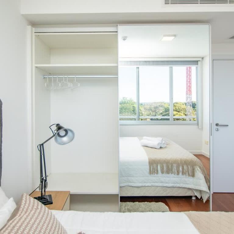 Executive Retreat with Balcony Sauna and Pool - Apartment - 21