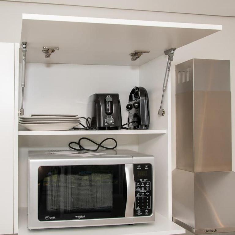 Stylish Hub Near Dining and Malls with Pool&Gym - Apartamento - 25