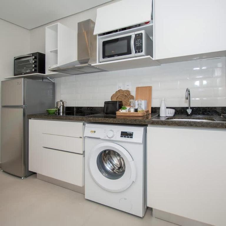 Vibrant Stay with Rooftop BBQ Pool and Near Malls - Apartamento - 4