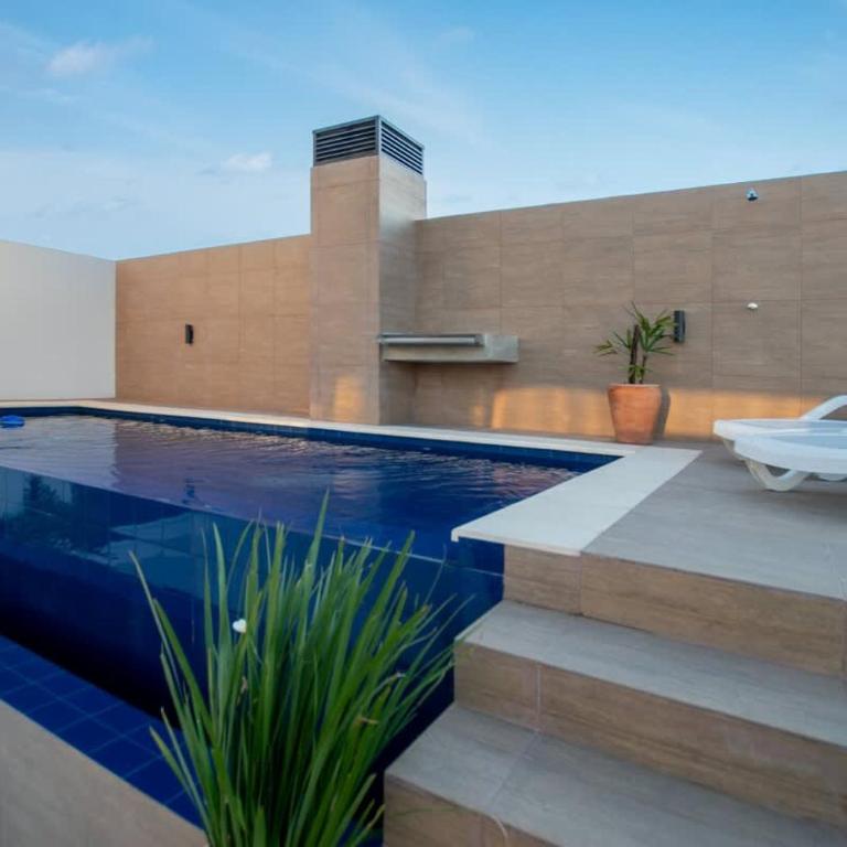 Vibrant Stay with Rooftop BBQ Pool and Near Malls - Apartamento - 39