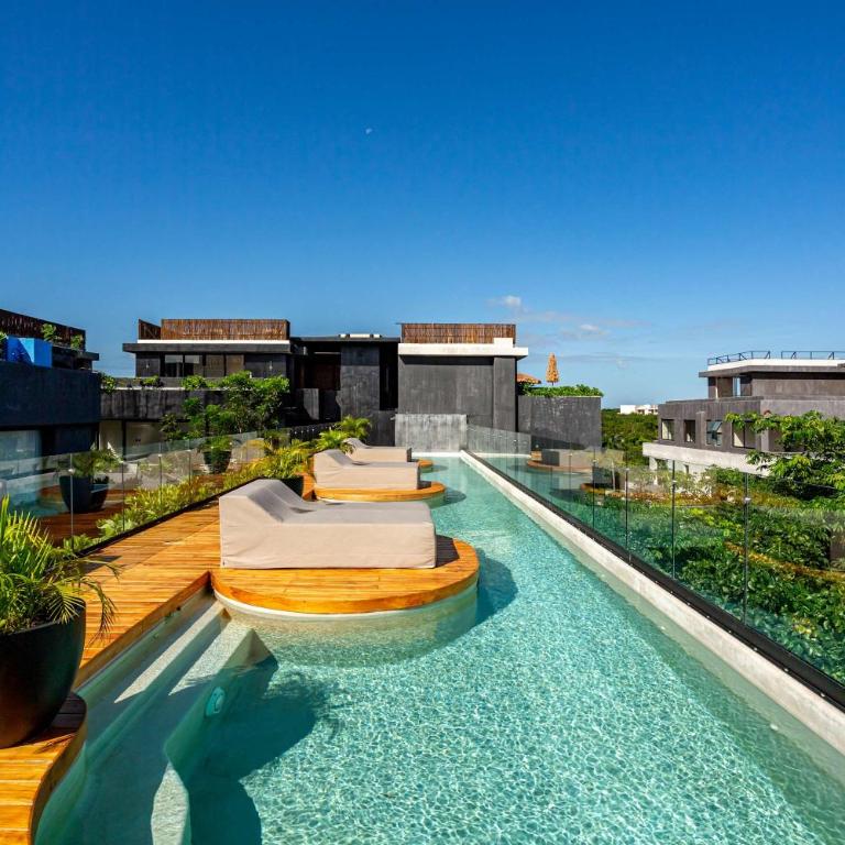Modern 1BR Jungle View Retreat in Humana with Rooftop Pool - Apartment - 12