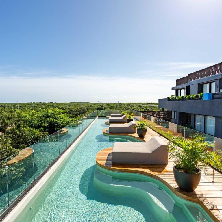 Modern 1BR Jungle View Retreat in Humana with Rooftop Pool - Apartment - 5