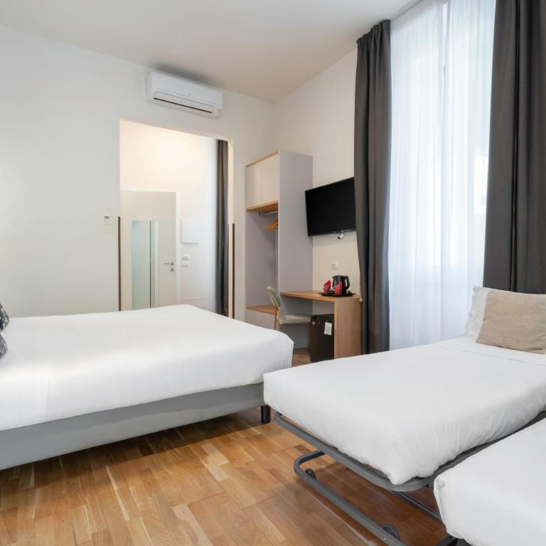 Hotel Cosmos - Chambre Quadruple - 3