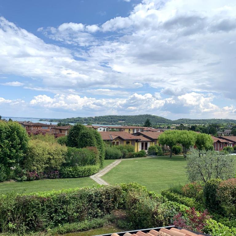 Gardasole family pool, wi-fi, private garden Garda Pleasure By Bookinggardalake - Apartment mit Gartenblick - 12
