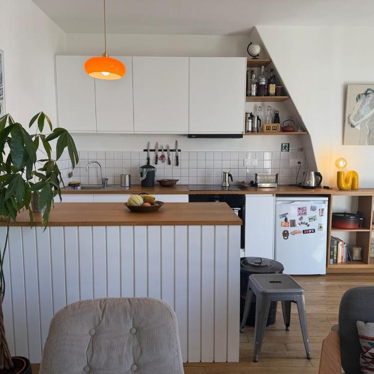 Appartement lumineux à 5 minutes des Buttes-Chaumont - Appartement 1 Chambre - 12