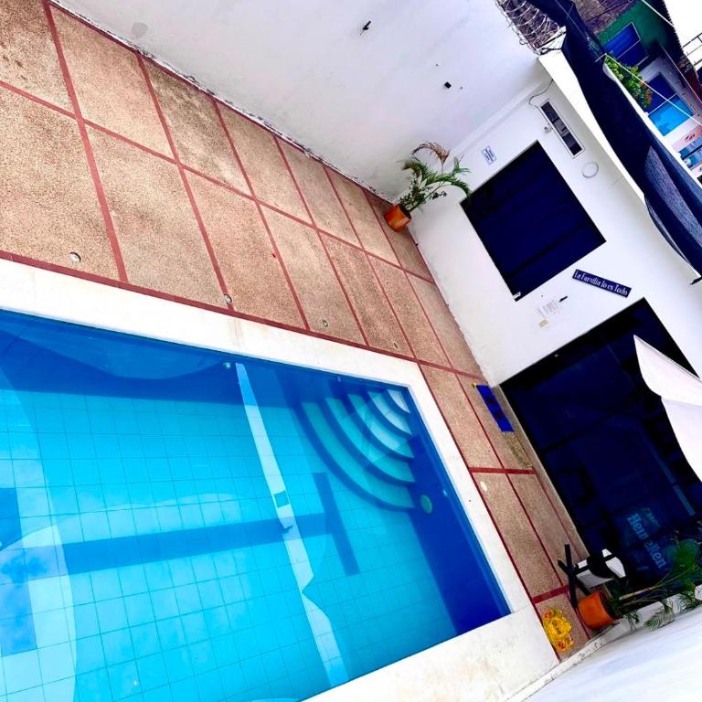 CASA VACACIONAL REMODELADA EN CARMEN de APICALA - Three-Bedroom House - 21