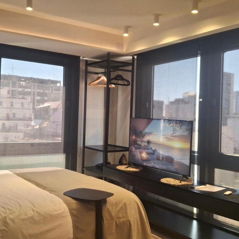 Comodidad y belleza, seguridad 24hs, céntrico, cochera, zona Galerías Pacífico y Obelisco - Apartamento Deluxe de 1 dormitorio con vistas a la ciudad - 18