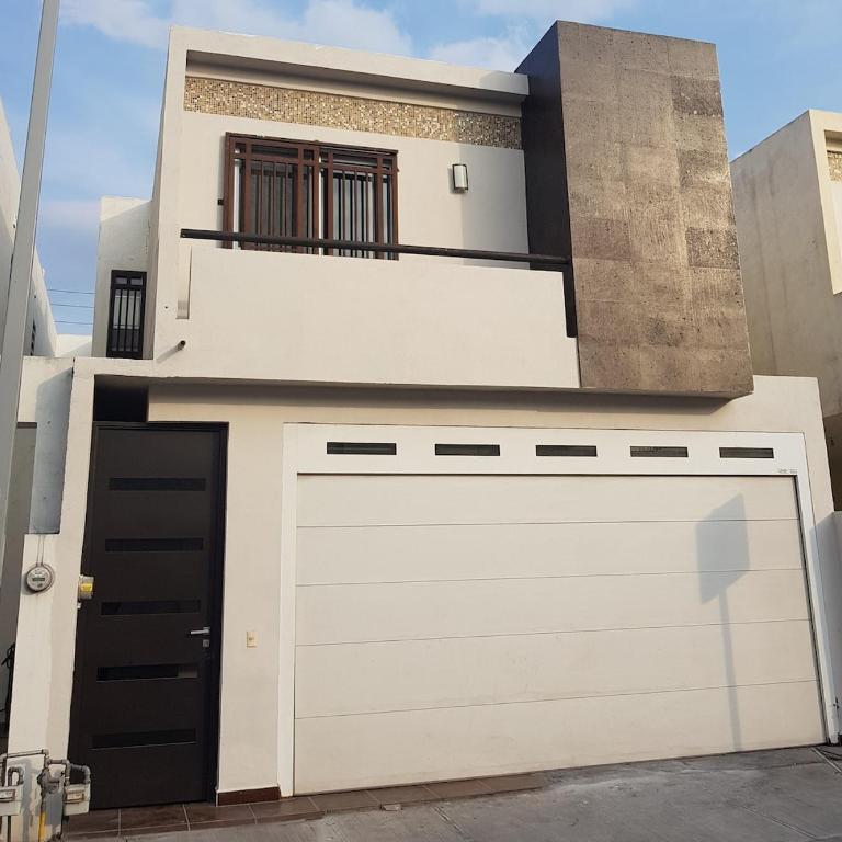 Casa Ideal para Empresas y Familias - Casa de 3 dormitorios - 1