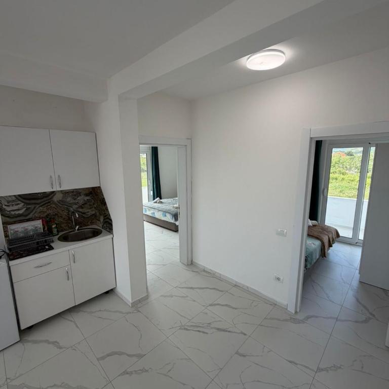 Apartments Gzim Peja - Deluxe Apartment mit 2 Schlafzimmern und Gartenblick - 5