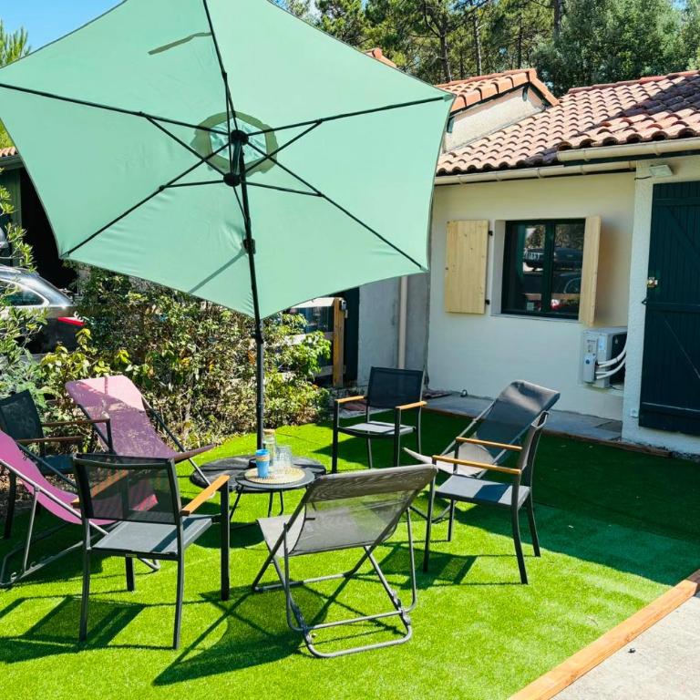 Maison avec jardin et piscine partagée à Moliets - Maison de Vacances - 1