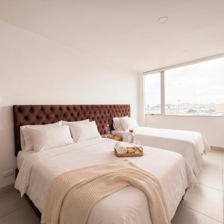 Departamento de 3 habitaciones frente a Mall del Sol - 5 min del aeropuerto - Two-Bedroom Apartment - 10