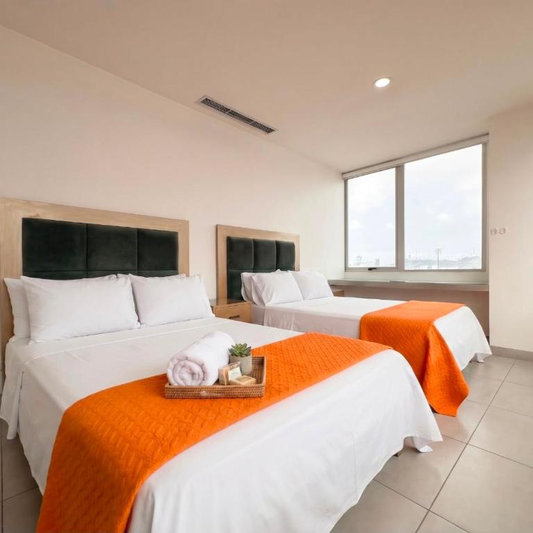 Departamento de 3 habitaciones frente a Mall del Sol - 5 min del aeropuerto - Two-Bedroom Apartment - 12
