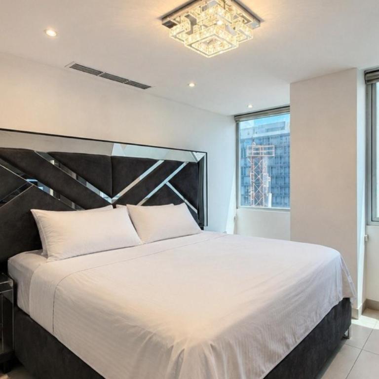 Departamento con habitaciones cerca de centro comercial, aeropuerto - Apartamento de 2 dormitorios con vistas a la ciudad - 8