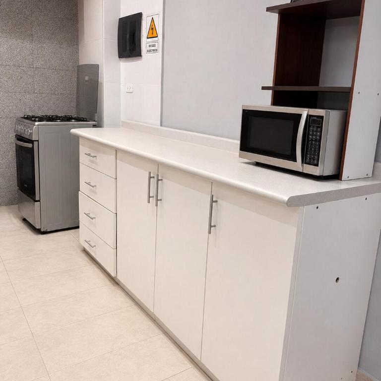 Centrally-located mini apartment one block from the church - One-Bedroom Apartment - 1